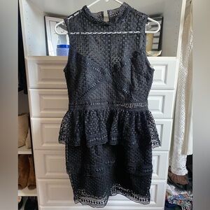 Lulus black cocktail dress with beautiful crochet detailing.  Size medium